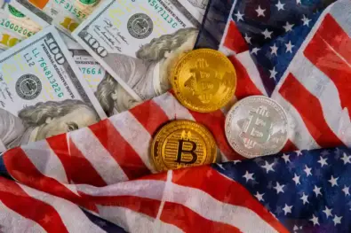 US dollar bill and Bitcoin cryptocurrency coin and banknotes of US dollar virtual money on the US flag.